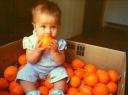 child_eating_oranges.jpg